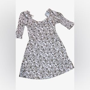 Light pink mini dress with brown floral design and quarter length sleeve